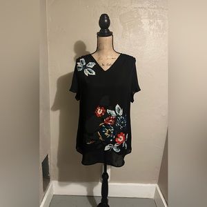 Black floral CABI blouse.